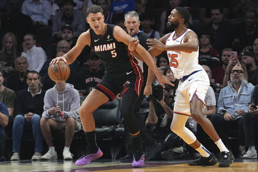 Karl-Anthony Towns nets 44 points as Knicks come back in 2nd half to defeat Heat 116-107.