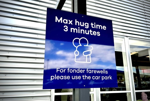 New Zealand airport sets 3-minute hug limit to reduce congestion during farewells.