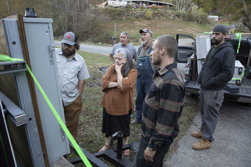 Volunteers provide solar energy assistance in the disaster area affected by Hurricane Helene