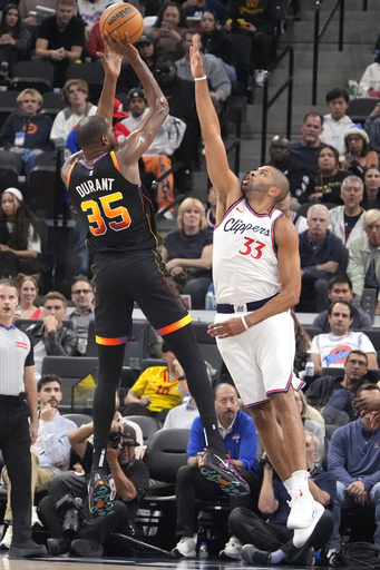 Booker and Durant propel Suns to a 125-111 comeback victory against Clippers.