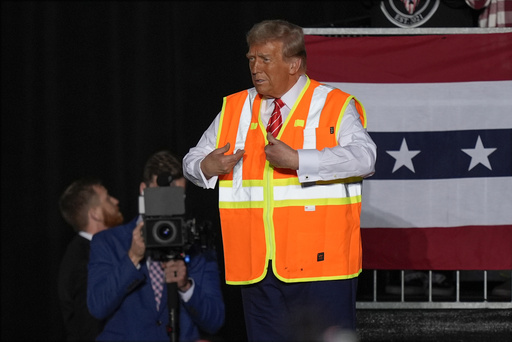 Donald Trump climbs onto a garbage truck to highlight Biden’s comment.