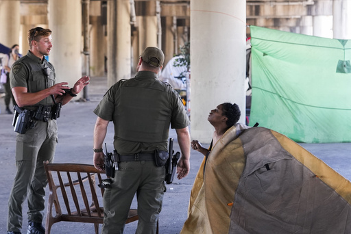 Court halts additional evacuations of encampments for the homeless in New Orleans prior to Taylor Swift shows.