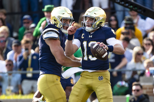 Lightning causes delay in Stanford vs. Notre Dame game, with the No. 11 Fighting Irish leading 42-7 after three quarters.