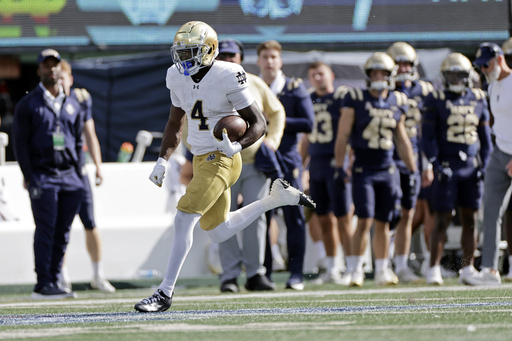 No. 12 Notre Dame hands No. 24 Navy first loss, capitalizing on mistakes.