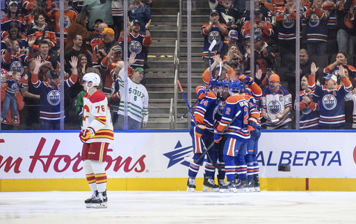 Andersson scores once and adds two assists as the flawless Flames defeat the struggling Oilers 4-1.