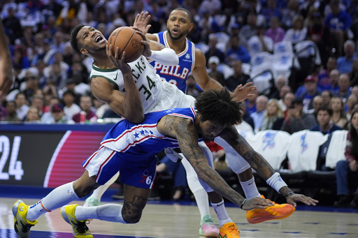 Lillard and Antetokounmpo lead Bucks to 124-109 victory over depleted 76ers