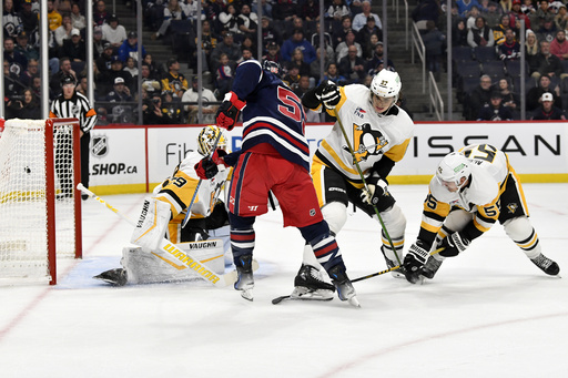 Winnipeg Jets extend their season-opening victory streak by defeating the Pittsburgh Penguins 6-3.