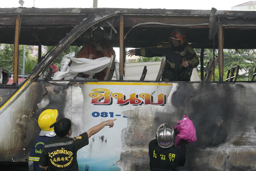 More than 20 are feared dead after a school bus catches fire in suburban Bangkok