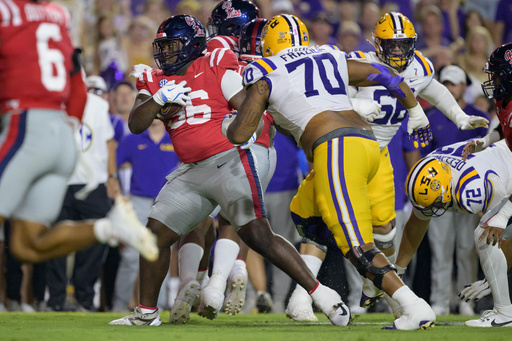 Nussmeier tosses clutch touchdown throws as No. 13 LSU comes back to defeat No. 9 Ole Miss 29-26 in overtime