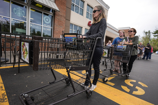 The Latest: Kirk becomes a hurricane as North Carolina reels from Helene