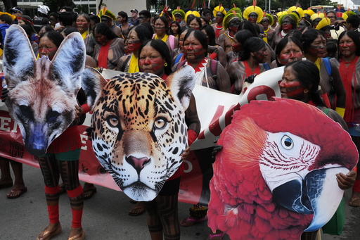 Native communities protest in Brazil’s capital over legislation restricting land rights.