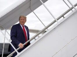 Republican presidential nominee former President Donald Trump boards his plane at West Palm Beach International Airport, Saturday, Oct. 5, 2024, in West Palm Beach, Fla., as he travels to a campaign rally in Butler, Pa. (AP Photo/Evan Vucci)