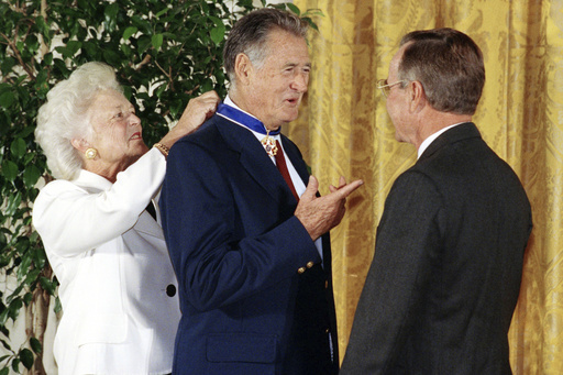 Ted Williams collectibles to be auctioned, featuring 1946 MVP trophy and Presidential Medal of Freedom.