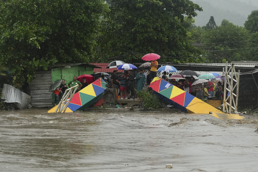 Tropical storm Sara inundates northern Honduras, predicting flash floods and mudslide risks.