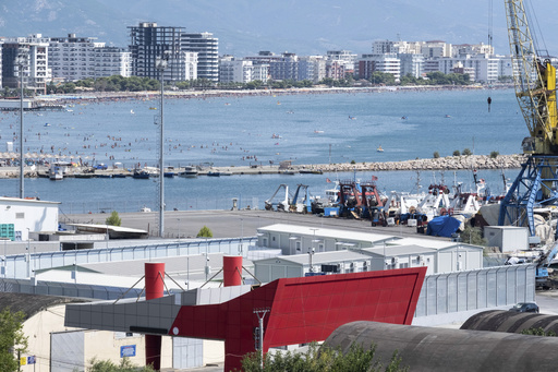 Italian vessel transports migrants to Albania in second trial of agreement to handle claims beyond EU borders.