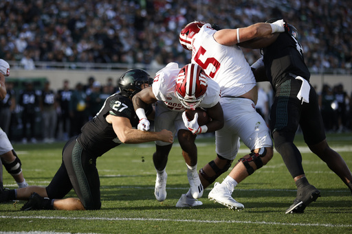 Rourke scores four touchdowns and Ferrell records two interceptions in No. 13 Indiana’s 47-10 victory over Michigan State.