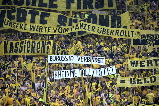 Borussia Dortmund’s CEO backs the team’s partnership with Germany’s leading defense contractor.