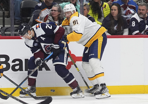 Samuel Girard snags the puck in overtime, netting a breakaway goal to secure a 3-2 win for the Avalanche against the Predators.