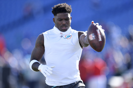 Tyreek Hill set to play for Dolphins against Rams despite wrist injury.