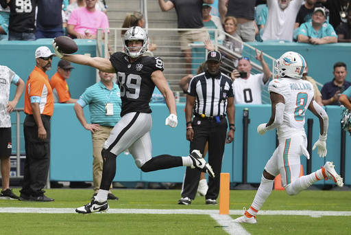 Tagovailoa passes for three touchdowns, guiding Dolphins to a 34-19 victory over Raiders for Miami’s second consecutive win.