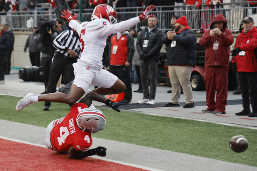 Second-ranked Ohio State dominates in the second half, defeating fifth-ranked Indiana 38-15