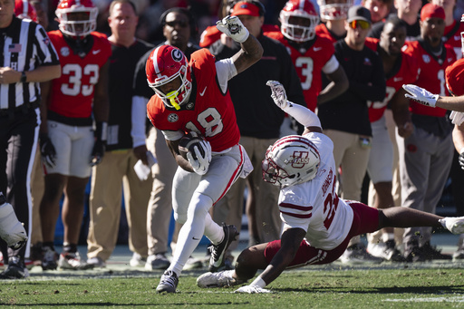 Beck tosses 4 touchdown passes while Frazier adds 3 rushing scores in No. 8 Georgia’s 59-21 victory over UMass.