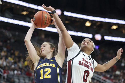 Top-ranked South Carolina narrowly escapes upset with 68-62 victory against Michigan