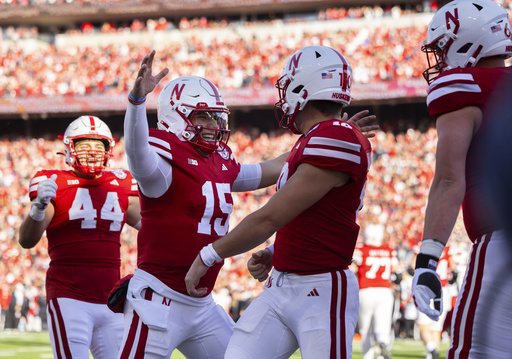 Nebraska and Iowa face off in chilly conditions, aiming to improve their bowl game standings.