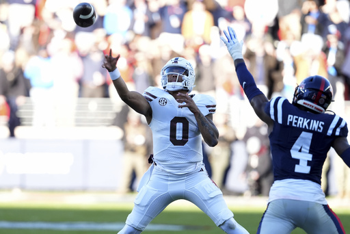 No. 15 Ole Miss defeats Mississippi State 26-14 to clinch Egg Bowl, maintaining narrow CFP aspirations