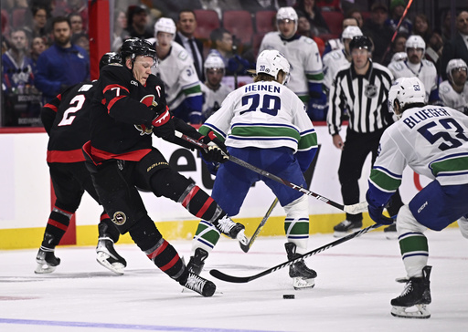 DeBrusk shines as Canucks edge out Senators for a 4-3 victory