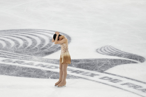 Amber Glenn clinches her maiden Grand Prix figure skating title despite a tumble.