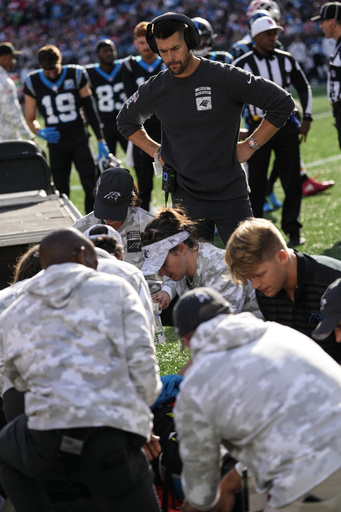 Rookie tight end Ja’Tavion Sanders of the Panthers taken off the field on a cart following neck injury.