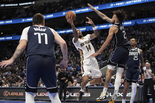 Darius Garland of Cleveland and Brandon Ingram from New Orleans sit out game due to injuries