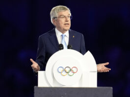 FILE - IOC President Thomas Bach addresses the audience during the 2024 Summer Olympics closing ceremony at the Stade de France, Aug. 11, 2024, in Saint-Denis, France. (AP Photo/Ashley Landis, File)