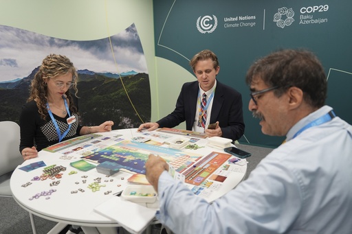 In a tabletop game, climate specialists strive to save the planet, mirroring the efforts of diplomats at COP29 in reality.