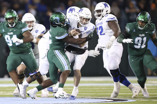 Desrosiers records three touchdowns, leading Memphis to a 34-24 victory over No. 18 Tulane, dashing the Green Wave’s slim CFP aspirations.