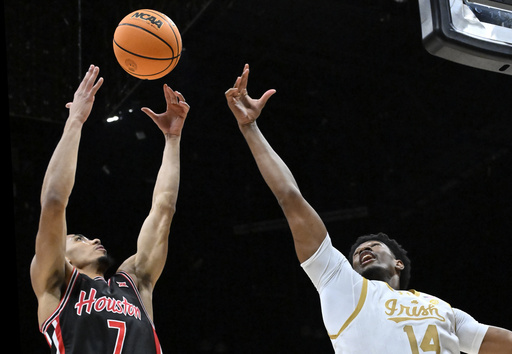 Houston, ranked 6th, maintains lead throughout to beat Notre Dame 65-54 in Players Era Festival