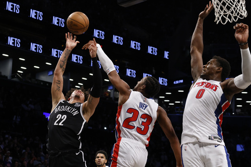 Six Pistons reach double digits in scoring to propel Detroit to 106-92 victory over Nets.