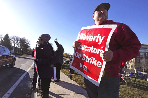 A judge promised to lift penalties on striking teachers in Massachusetts if they agree to resume teaching.