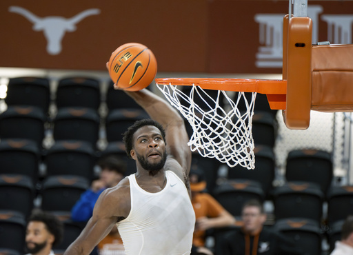 Tre Johnson, a freshman guard, scores 28 points as No. 19 Texas defeats Houston Christian 90-59.