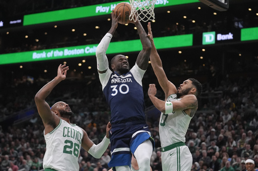 Jaylen Brown nets 29 points as Celtics secure 107-105 victory over Timberwolves with crucial defensive play.