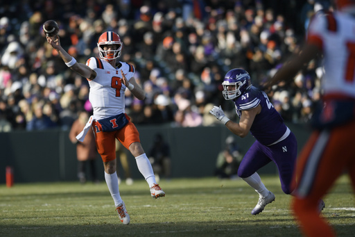 Aidan Laughery scored three touchdowns as bowl-eligible No. 22 Illinois defeated Northwestern 38-28, achieving their ninth victory.