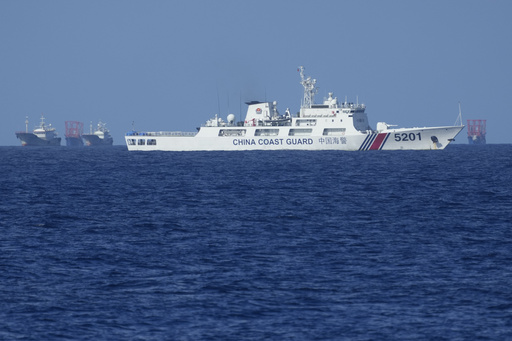 China establishes boundaries around a disputed shoal in the South China Sea amid conflict with the Philippines.