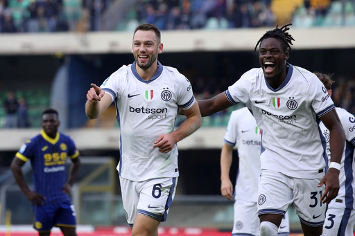 Inter dominates Verona 5-0, with Thuram scoring twice to momentarily top Serie A standings.