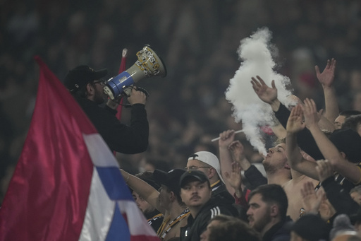 Lille reports two fans were stabbed during an assault on supporters before the Champions League match in Bologna.