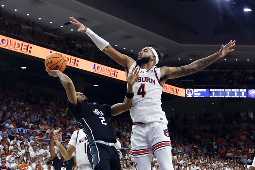 Kansas maintains its No. 1 rank prior to clash with No. 11 Duke; Ole Miss and Mississippi State rejoin AP Top 25