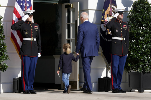 Joe Biden kicks off his last festive season in the White House by granting turkey pardons to ‘Peach’ and ‘Blossom’