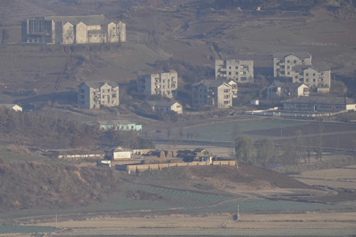 Patrons at this Starbucks enjoy their coffee while overlooking a serene village in North Korea.