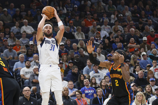 Mavericks narrowly defeat Thunder 121-119 as Washington scores 27 and grabs 17 rebounds in Doncic’s absence.