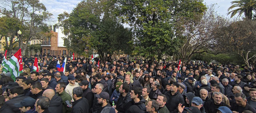 Demonstrators in the Abkhazia region of Georgia resist relinquishing government building control